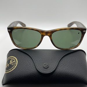 NWOT. Unisex. Ray Ban sunglasses. Tortoiseshell frames with green lenses.
